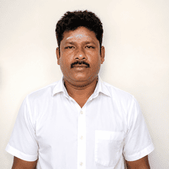 E. Manikkam